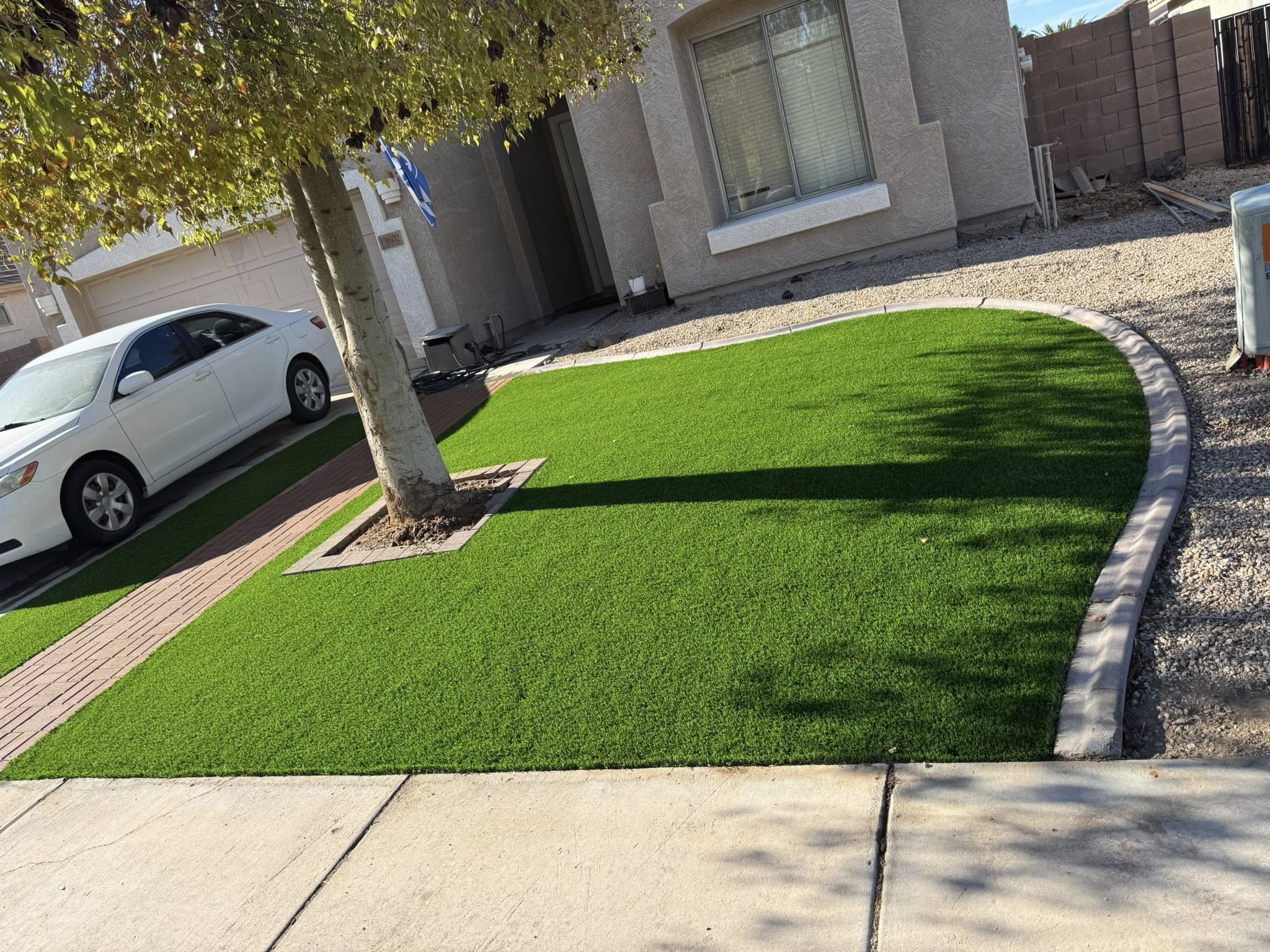 Front-yard xeriscape and rock bed