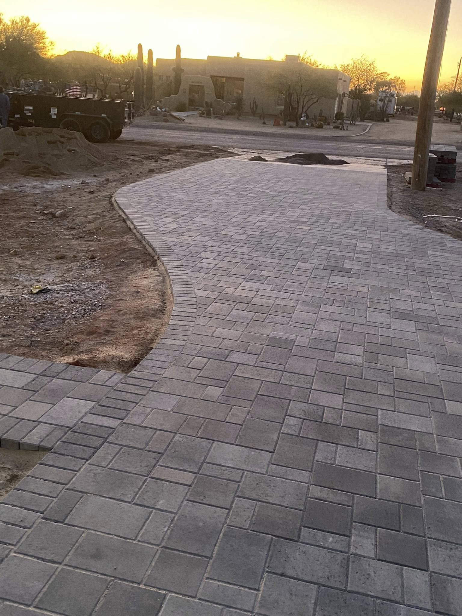 Concrete fire pit with seat wall