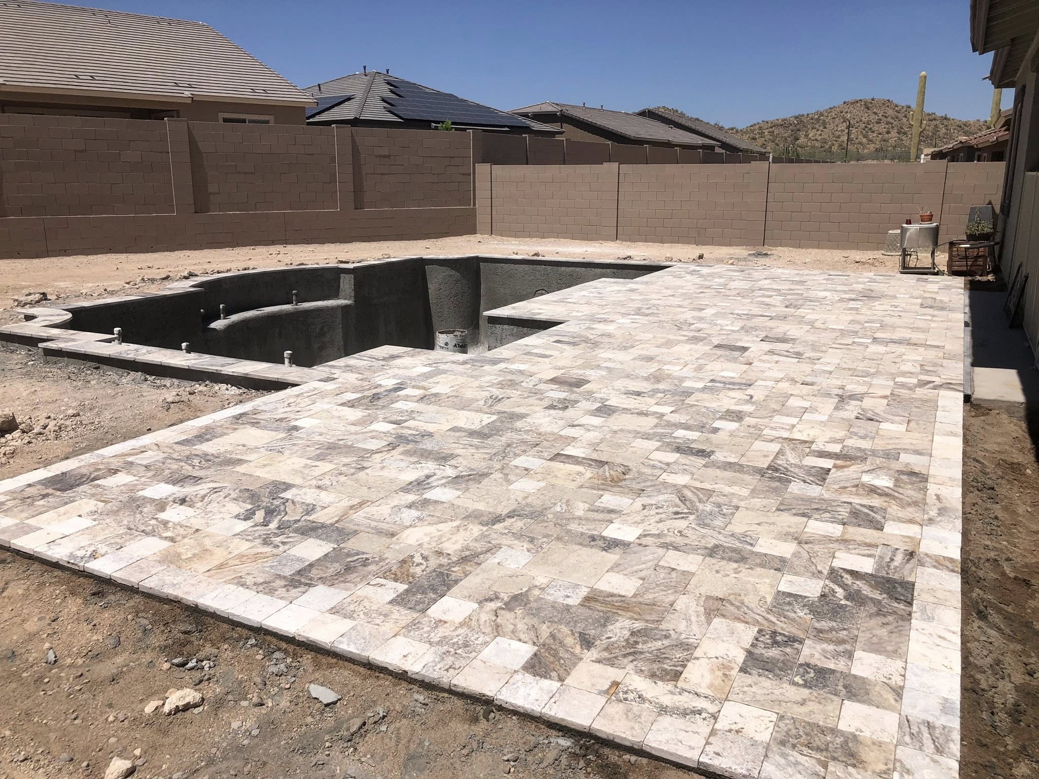 Pergola patio with sand-set pavers